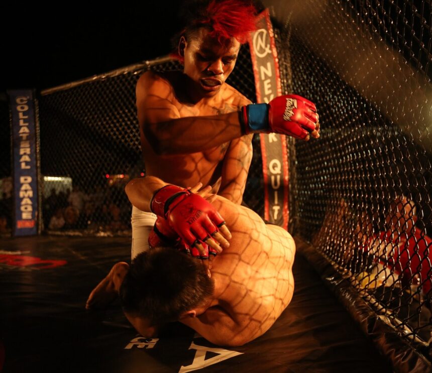 Mixed-martial arts fights heat up Combat Center 140620-M-ZM882-066
